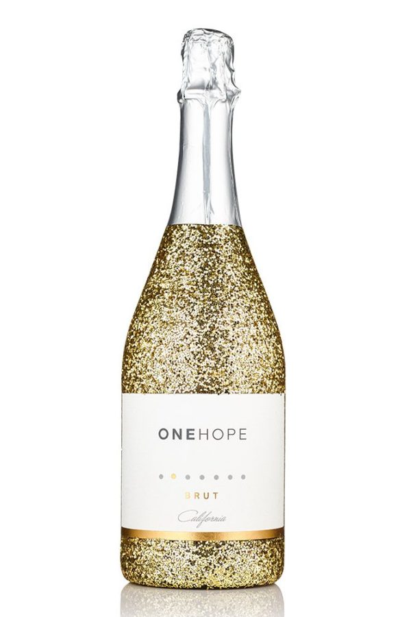 sparkling wine in a gold glitter bottle