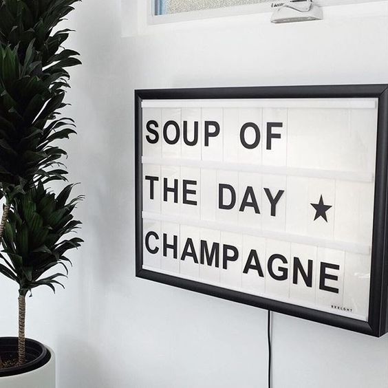 sign that says Soup of the Day is Champagne