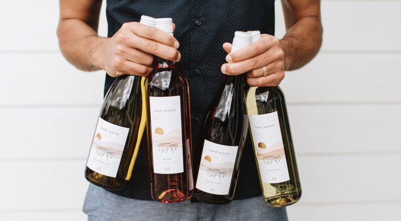 Man holding ONEHOPE Wine wine options perfect for Memorial Day cocktails