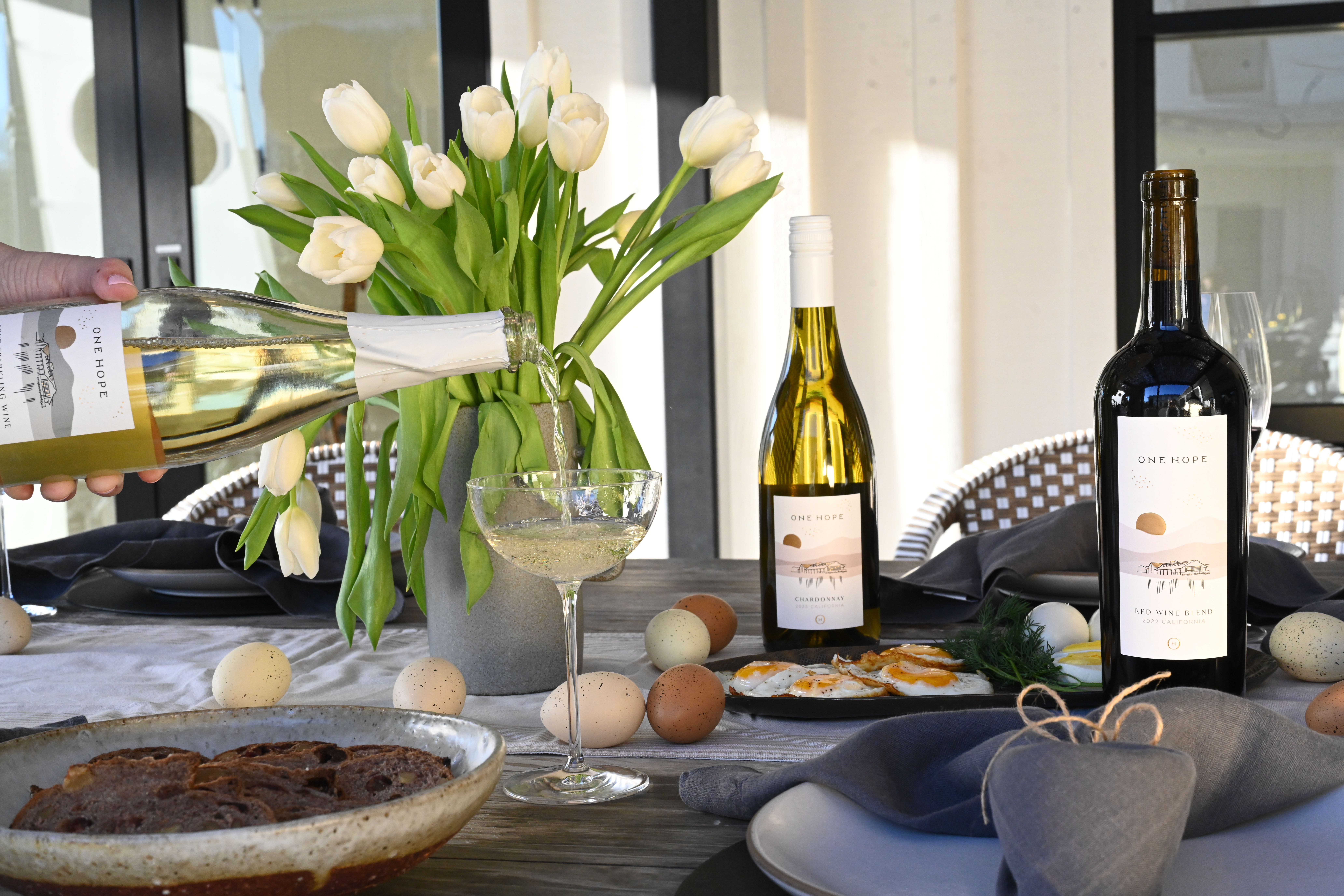  Easter entertaining tablescape with tulips and wine glasses